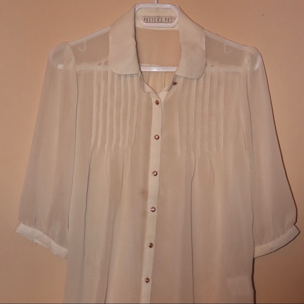 3/25$ Off white blouse